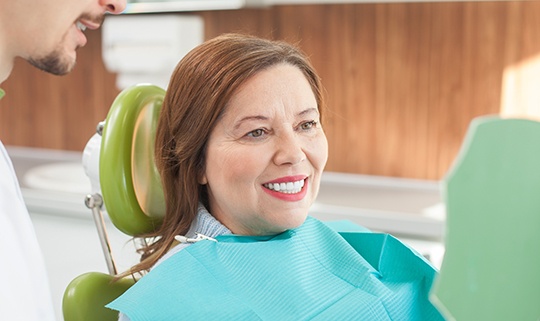 Woman smiling at the dentist