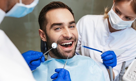 Man smiling in the dental chair